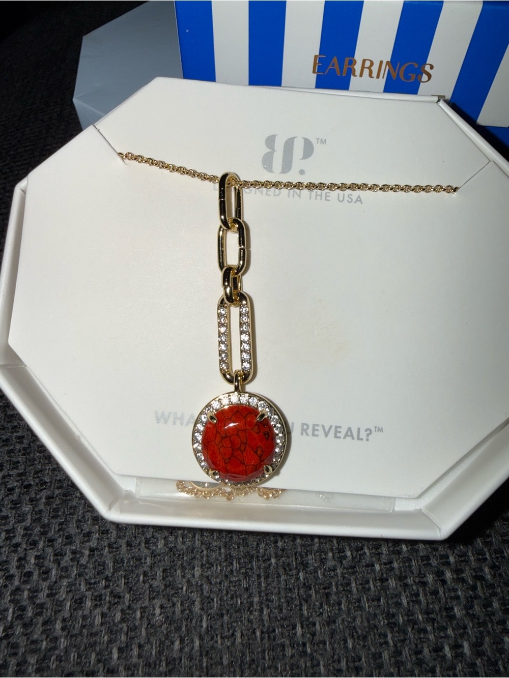 Red coral on gold necklace